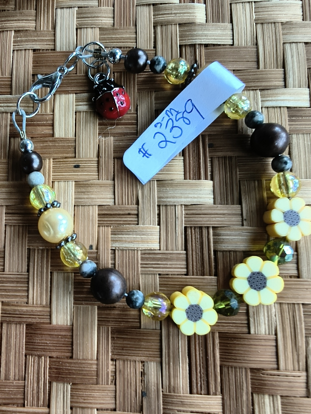 Yellow Floral Beaded Bracelet with Ladybug Charm